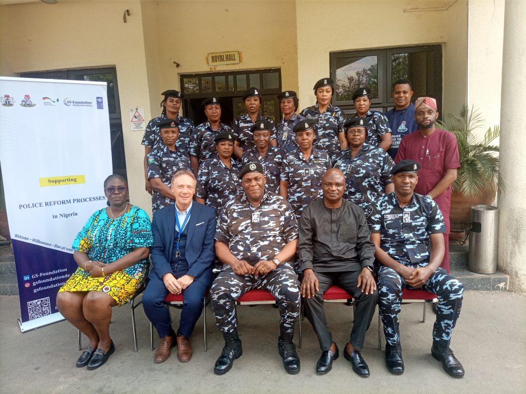 Group picture with police force.