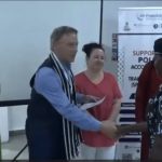 Peter Heepen shakes hands with Gender Desk Officer Training participant