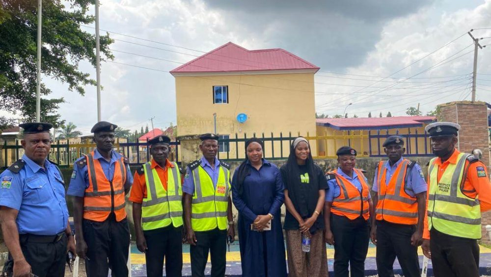Group photo of Nigerian Police Force officers and trainers during the in-house training in Garki, Abuja.