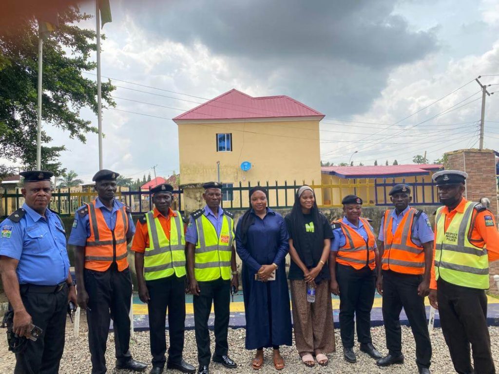 Group photo of Nigerian Police Force officers and trainers during the in-house training in Garki, Abuja.