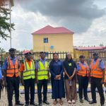 Group photo of Nigerian Police Force officers and trainers during the in-house training in Garki, Abuja.