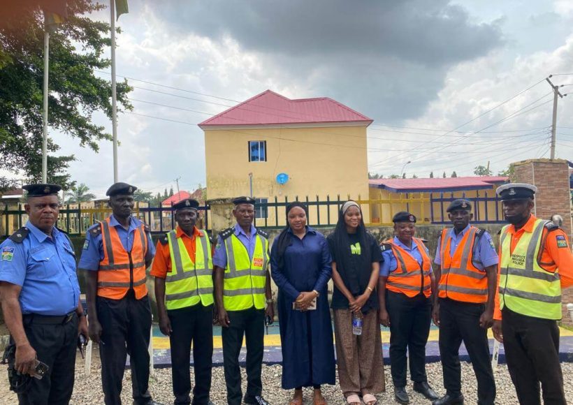 Group photo of Nigerian Police Force officers and trainers during the in-house training in Garki, Abuja.