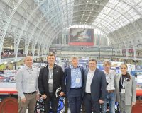GS-F and Moldovan Police team posing in front of the impressive architecture at the International Security Expo in London.